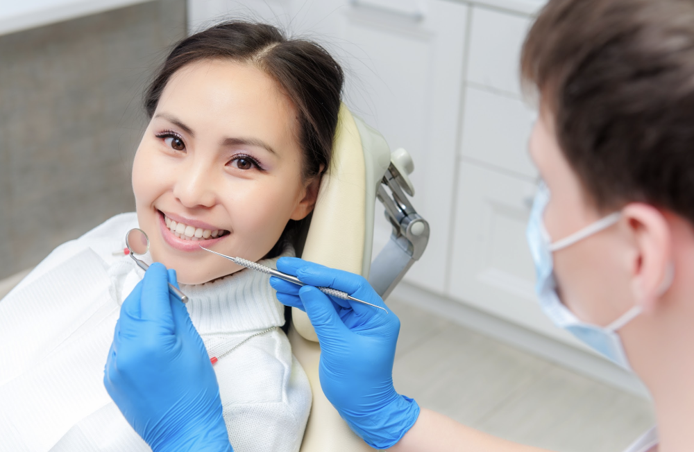 dental crowns boise | woman at dentist